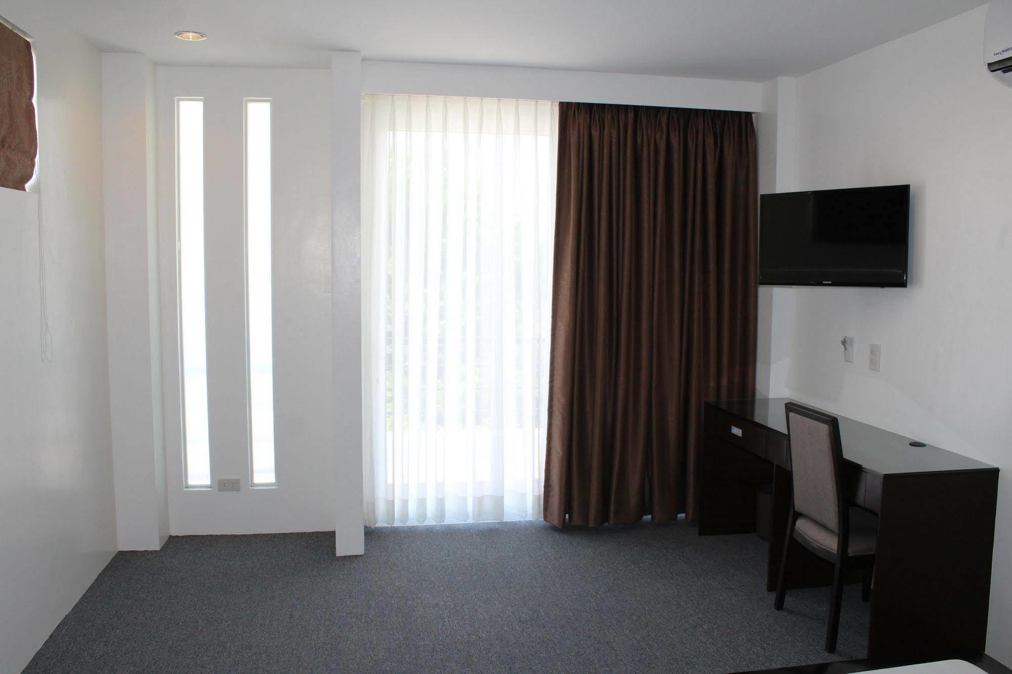 Be-Ing Suites Davao Bagian luar foto